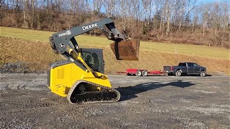 how to change bucket on john deere 333d skid steer|john deere 333d youtube.